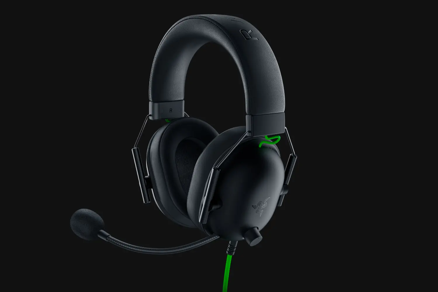 Razer BlackShark V2 X wired gaming headset in black with boom microphone and green cable