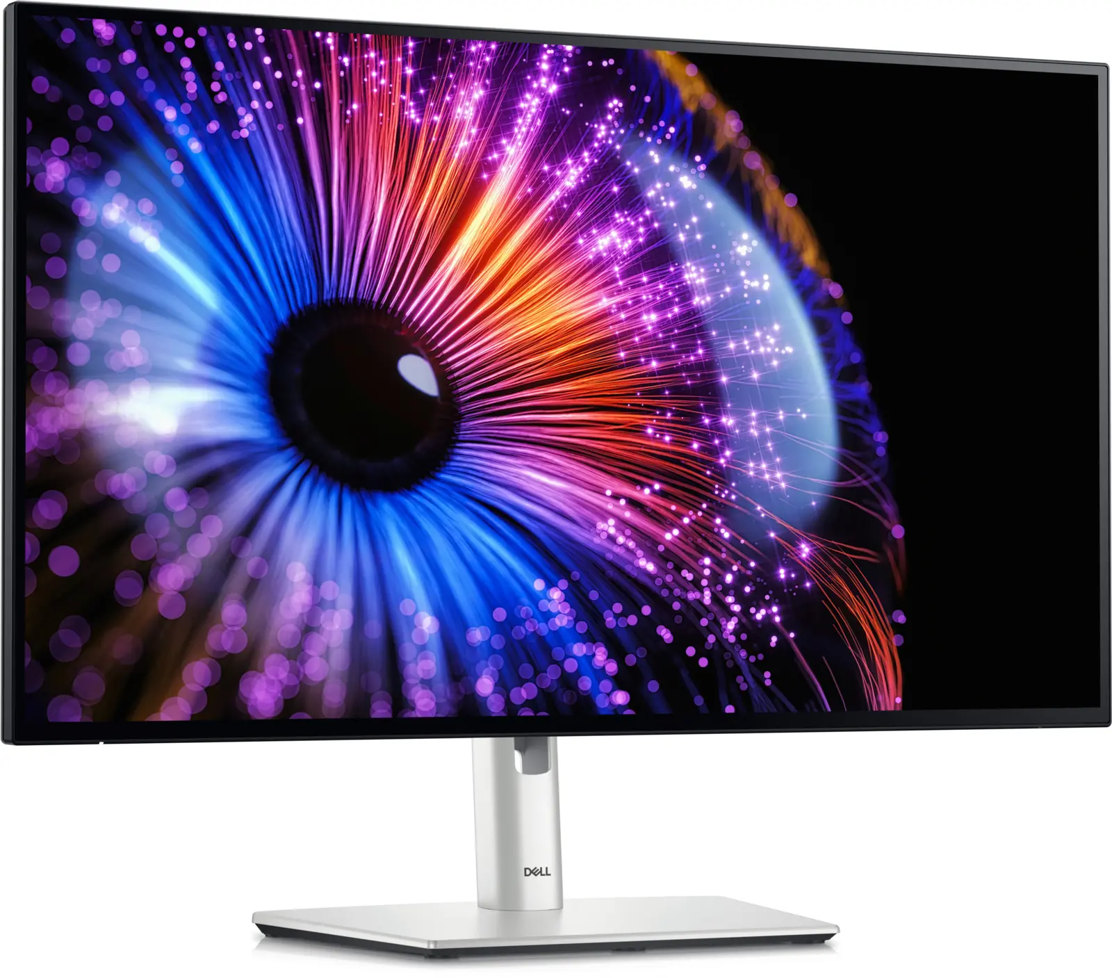 Dell UltraSharp U2724DE 27-inch monitor, front-left angled view on its silver height-adjustable stand, with colourful abstract artwork on screen.