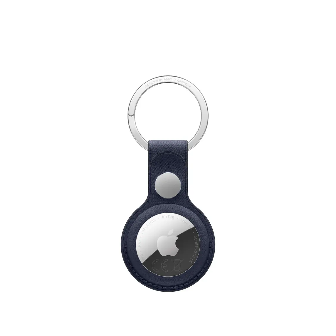 AirTag FineWoven Key Ring, snap closure button, stainless steel key ring, navy colour (dark blue) material covers the outer edge of AirTag, circular cutout, AirTag visible, Apple logo centred