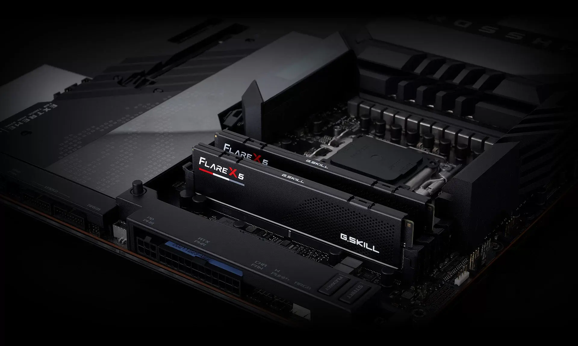 G.SKILL Flare X5, black — Two matching modules are pictured; the motherboard is a presentation prop and is not included.